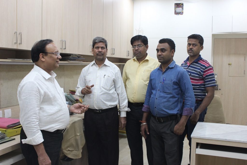 Mr Vijay Kumar Gupta interacting with his staff